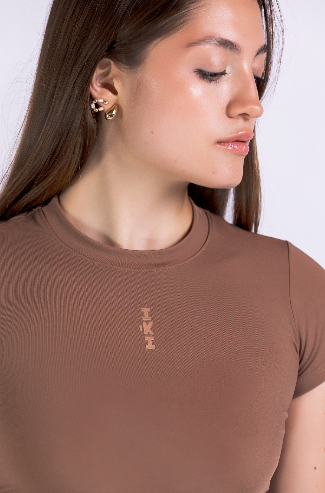 RISE TOP – Crop top deportivo athleisure con tecnología LYCRA®