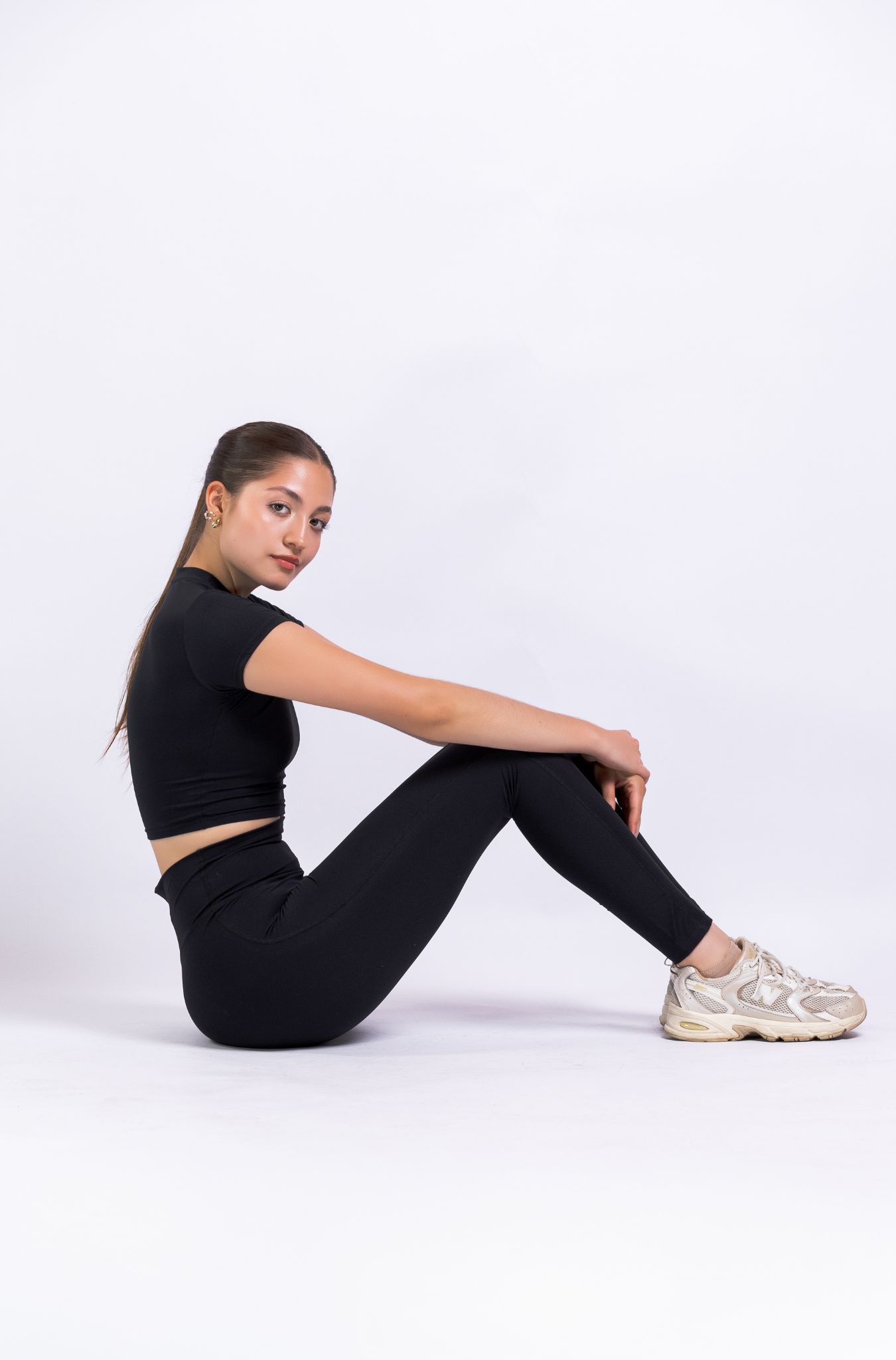 RISE TOP – Crop top deportivo athleisure con tecnología LYCRA®