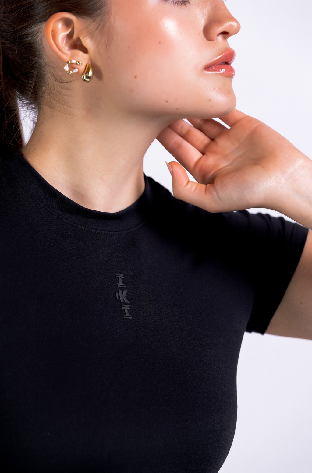 RISE TOP – Crop top deportivo athleisure con tecnología LYCRA®