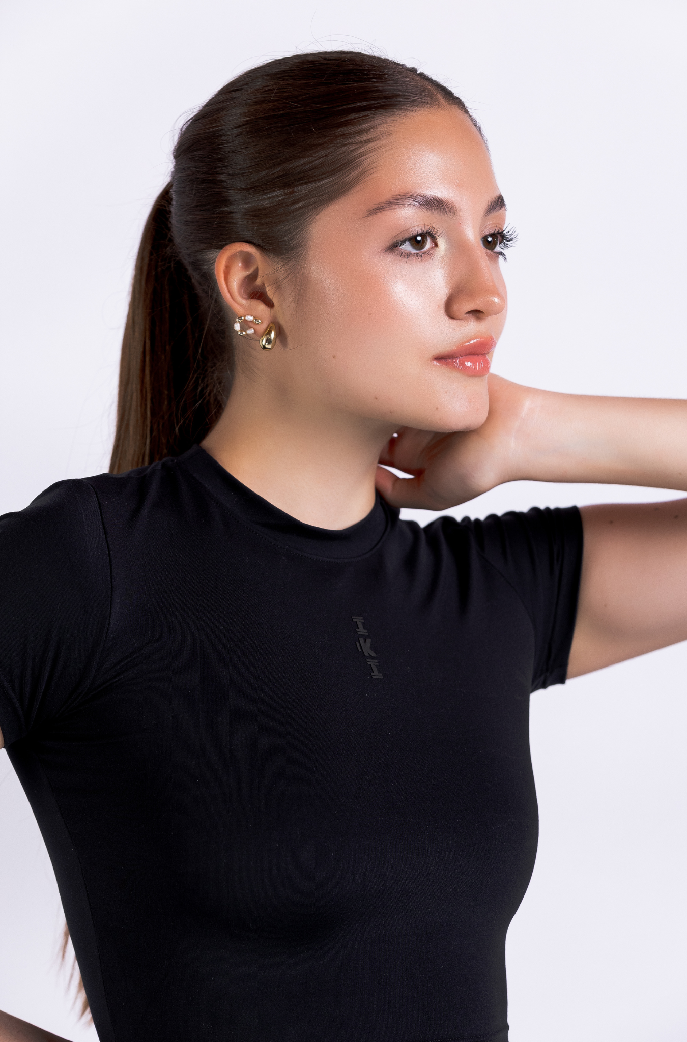 RISE TOP – Crop top deportivo athleisure con tecnología LYCRA®