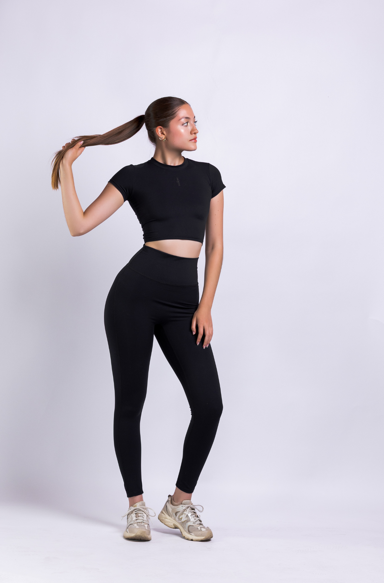 RISE TOP – Crop top deportivo athleisure con tecnología LYCRA®